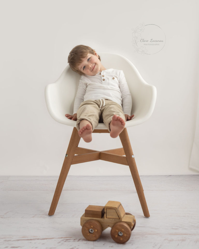 Mini Memento Photography Session|Boy sitting on white chair | Brisbane Studio